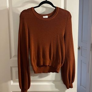 Deep orange sweater with bubble sleeves
